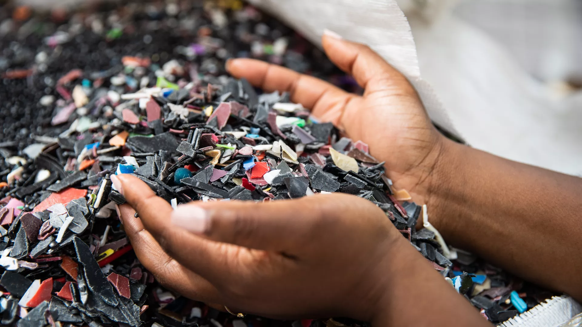 Mr Green Africa hands with plastic chips